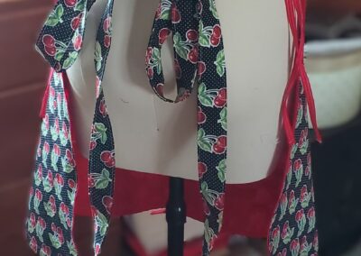 reverse cherry harvesting apron back