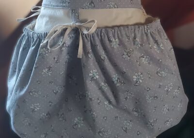 blue flower gathered harvesting apron front