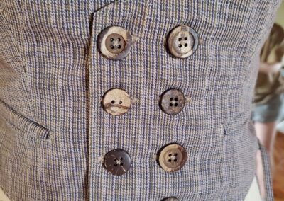 belladonna vest buttons closeup