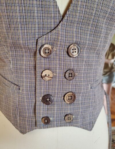 belladonna vest buttons closeup