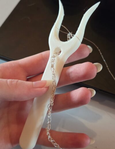 lucet fork and lucet cord made with silver embroidery floss
