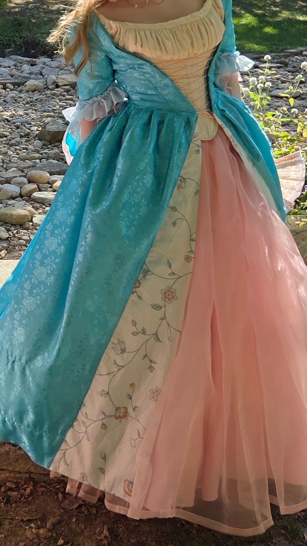 pauper dress being worn at Renaissance Faire standing