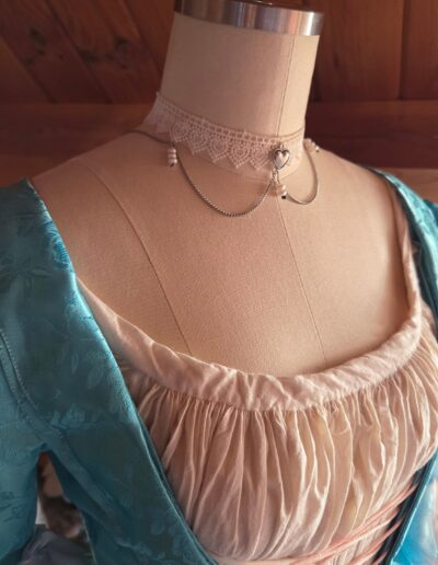 pauper dress necklace with the gown