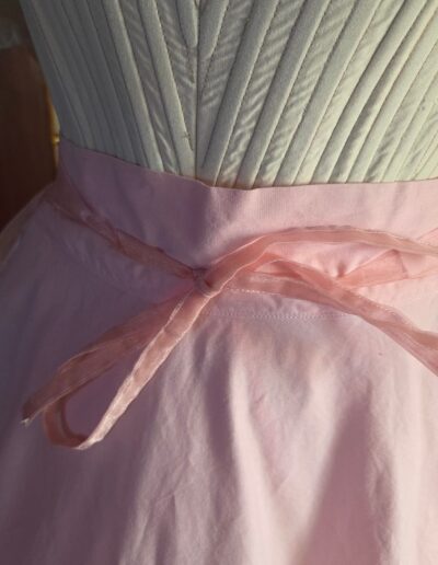 organza overskirt front tied closeup