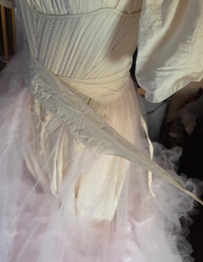 tulle petticoat back ties being tied