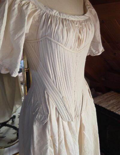 pair of stays front view over chemise