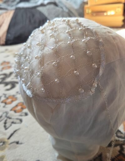 net cap displayed on mannequin head