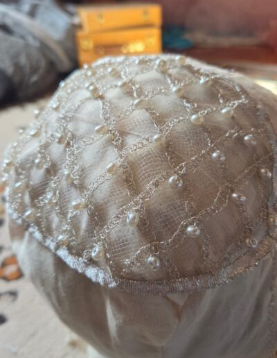 net cap displayed on mannequin head