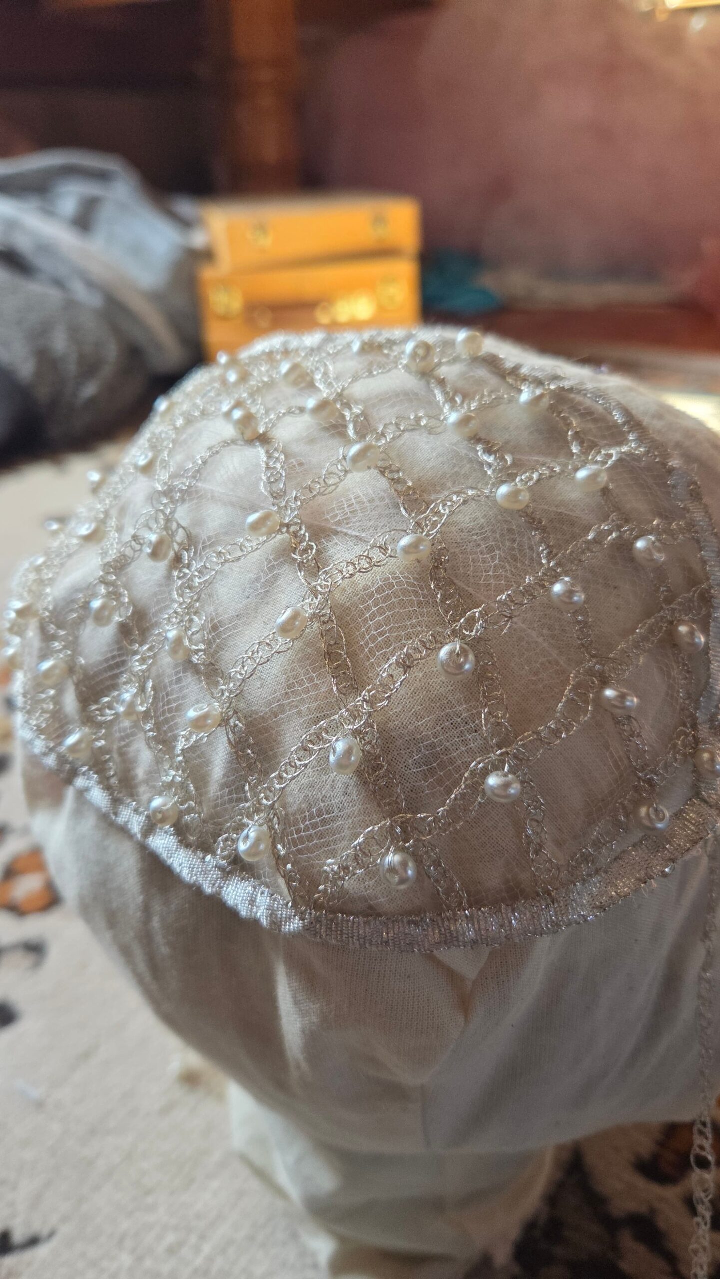 net cap displayed on mannequin head