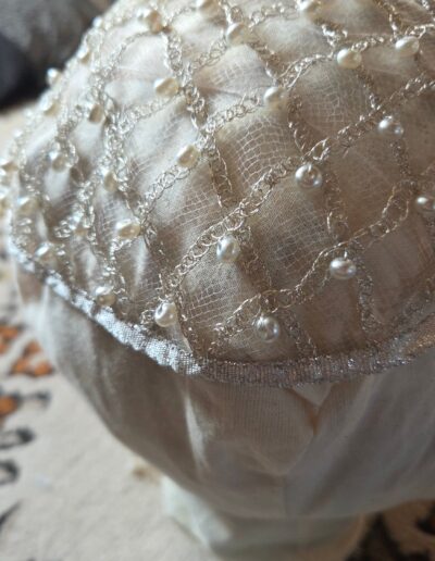 closeup view of finished net cap and ribbon