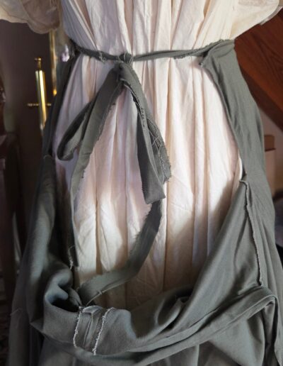 green floor length circle skirt front ties closeup